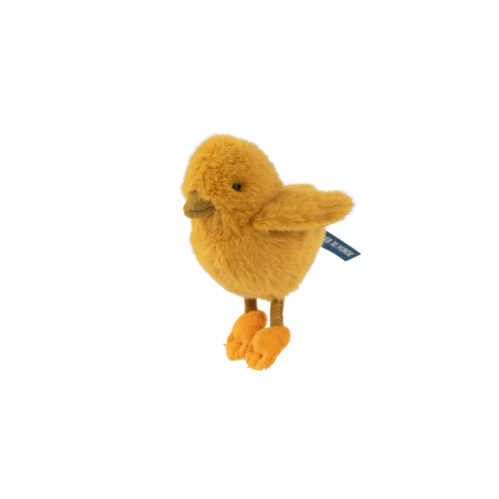 Yellow plush chick toy with orange feet on transparent background