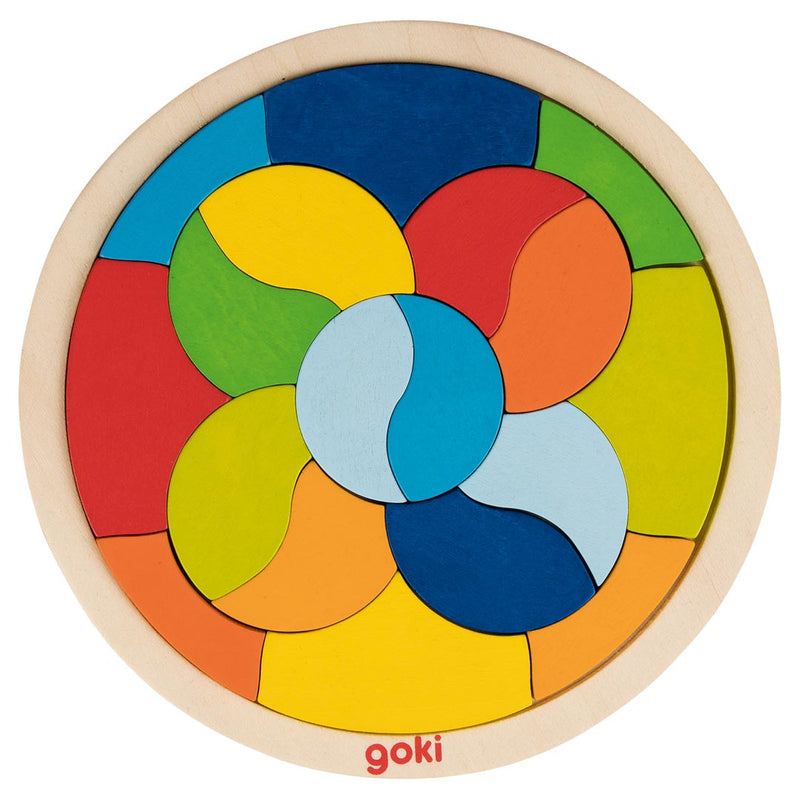 Goki Mandala wooden circular puzzle with colorful swirling geometric pieces on white background