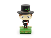 Tonie Christmas Carol figurine with black top hat and holly decoration on green base