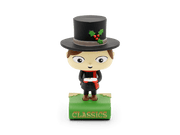 Tonie figurine of character in top hat with holly decoration on green base labeled Classics