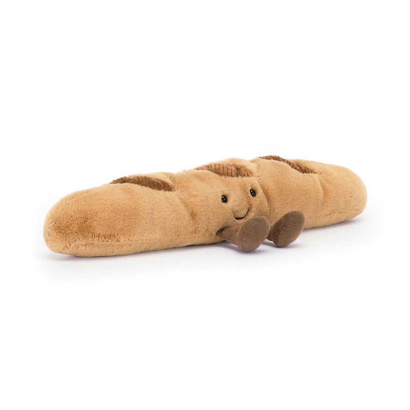 Jellycat Amuseables Baguette plush toy with face and brown cord feet on white background