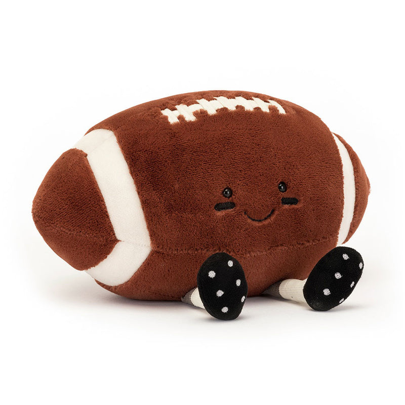 Brown plush football toy with white stripes and black cleats by Jellycat