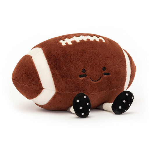 Brown plush football toy with white stripes and black cleats by Jellycat