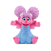 Abby Cadabby Tonie figure with pink fur and blue dress on clean background