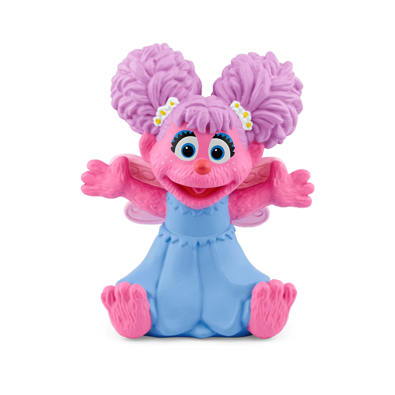 Abby Cadabby Tonie figure with pink fur and blue dress on clean background