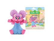 Abby Cadabby Tonie figure with purple pigtails and blue dress next to Sesame Street story card