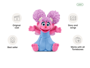 Tonie Abby Cadabby figure with pink hair and blue dress showing product features