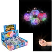 Squish & Stretch Surprise Dumplings display box with colorful squishy mesh-covered stress balls being squeezed