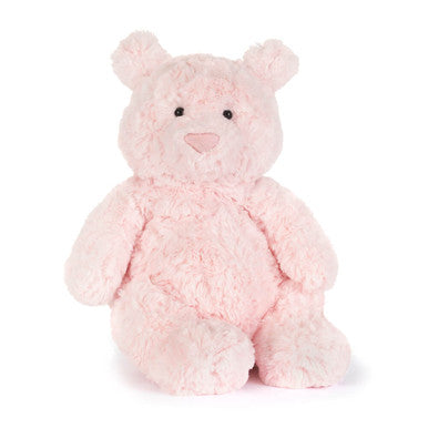 Pink fluffy teddy bear plush toy on white background