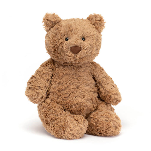 Brown plush teddy bear with fluffy textured fur sitting on white background