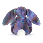 Jellycat Zodihop Luxe Bunny in rainbow tie-dye colors with white tail on white background