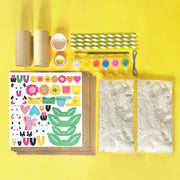 Paper mache craft kit with cardboard tubes, stickers, paints, straws and tissue paper