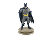 Batman Tonie figure in gray suit with yellow belt on circular base