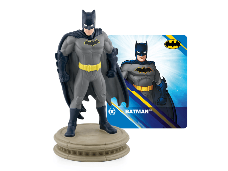 Batman Tonie figurine with grey suit and cape next to DC packaging card