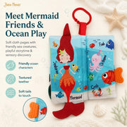 Open Bebe Mondo Mermaid Tails Crinkle Cloth Book with mermaid, seahorse, fish, octopus and textured teether.