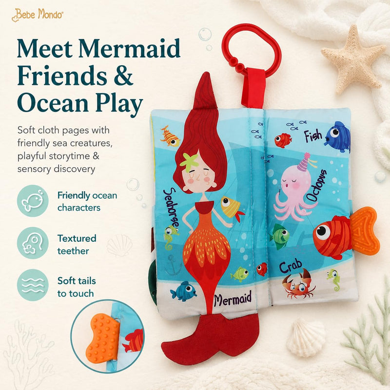 Open Bebe Mondo Mermaid Tails Crinkle Cloth Book with mermaid, seahorse, fish, octopus and textured teether.
