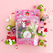 Bunny Berry Village KidDough play kit with strawberry-themed accessories on pink background