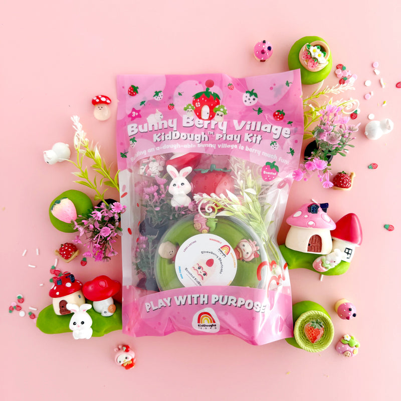 Bunny Berry Village KidDough play kit with strawberry-themed accessories on pink background