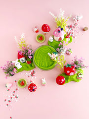 Bunny Berry Village playdough set with mushroom houses, bunnies, flowers on pink background