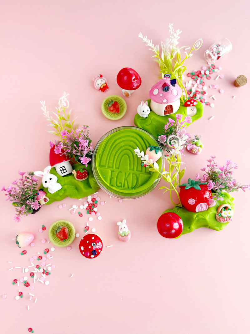 Bunny Berry Village playdough set with mushroom houses, bunnies, flowers on pink background