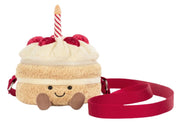 Jellycat Amuseables Birthday Cake plush crossbody bag with red strap and candle