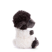 Plush sheep stuffed animal with black curly fleece head and white body