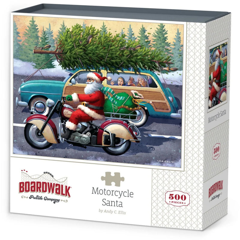 Boxed jigsaw puzzle titled "Motorcycle Santa" by Andy C. Ellis, showing a vintage illustration of Santa riding a motorcycle with a Christmas tree on a teal wood-paneled car.
