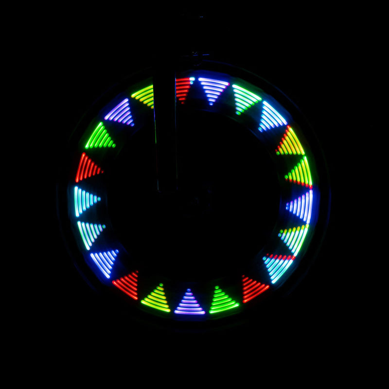 Shape Brightz LED spoke light displaying colorful triangle patterns on one bicycle wheel.