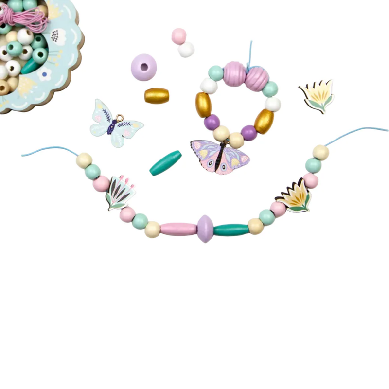 Colorful bead necklace with butterfly and shell decorations on a white background