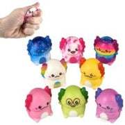 Collection of colorful 2-inch Christmas-themed squishy toys including ice cream and characters
