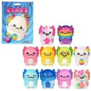Collection of colorful 2-inch Christmas-themed squishy toys with cute animal faces and holiday packaging