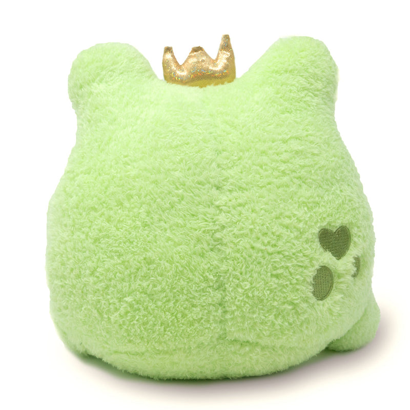Green plush frog toy with golden crown sitting upright on white background