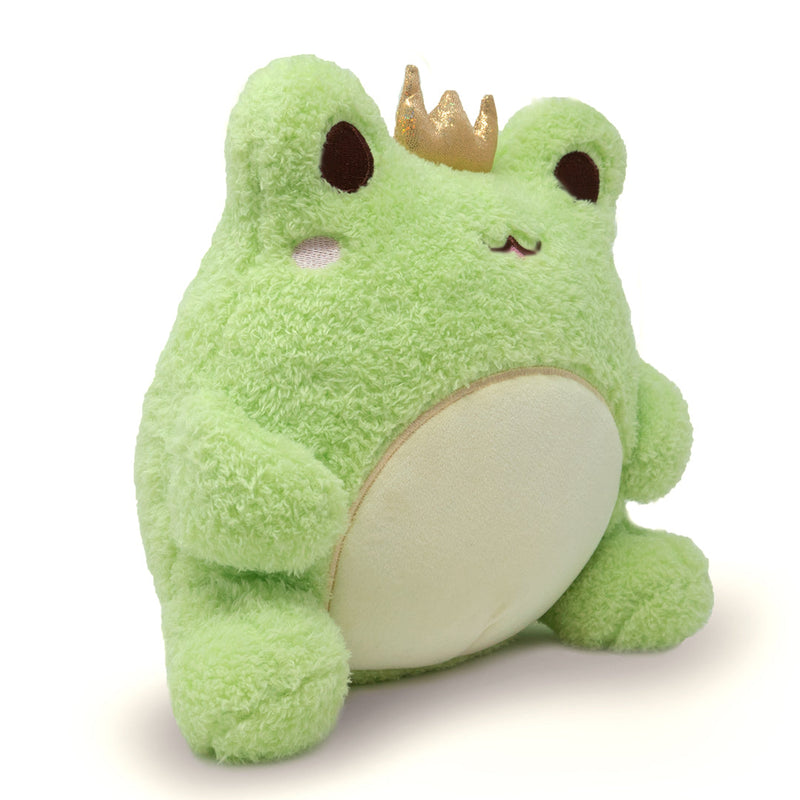 Green plush frog toy with golden crown and cream colored belly