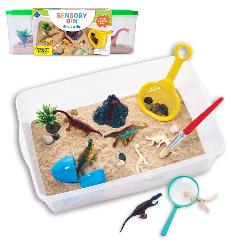 Creativity for Kids Sensory Bin Dinosaur Dig set with sand, dinosaur figures, and tools