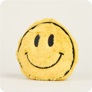 Yellow fuzzy smiley face plush toy with black embroidered features on white background