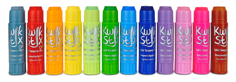 Twelve colorful Kwik Stix tempera paint sticks arranged in a row showing different colors
