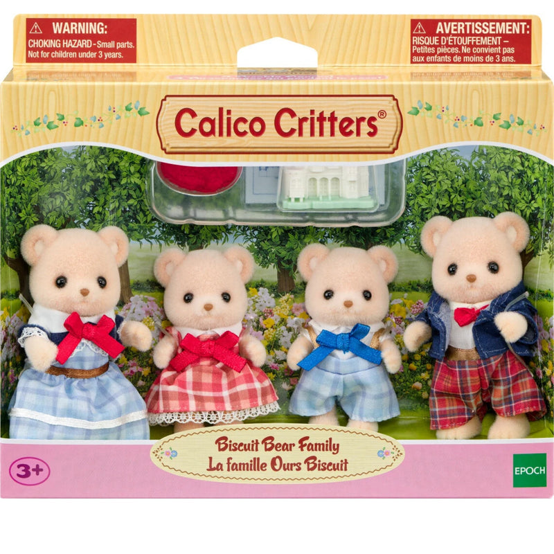 Colico Critters Biscuit Bear Family toy set in its original retail packaging, featuring four small teddy bear figures dressed in blue and red outfits with a small house accessory visible behind them.