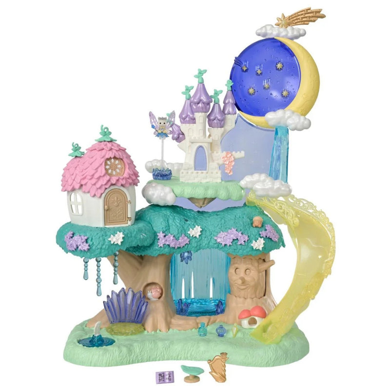 A whimsical fairy-themed treehouse playset with a pink-roofed cottage, purple castle towers, a large blue moon with stars, a translucent yellow slide, and a waterfall, shown on a plain white background.