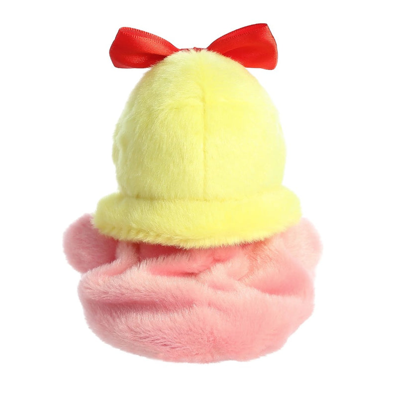 Backside of Cindy Lou Hoo plush.  Yellow hair, red bow and pink body on white background.