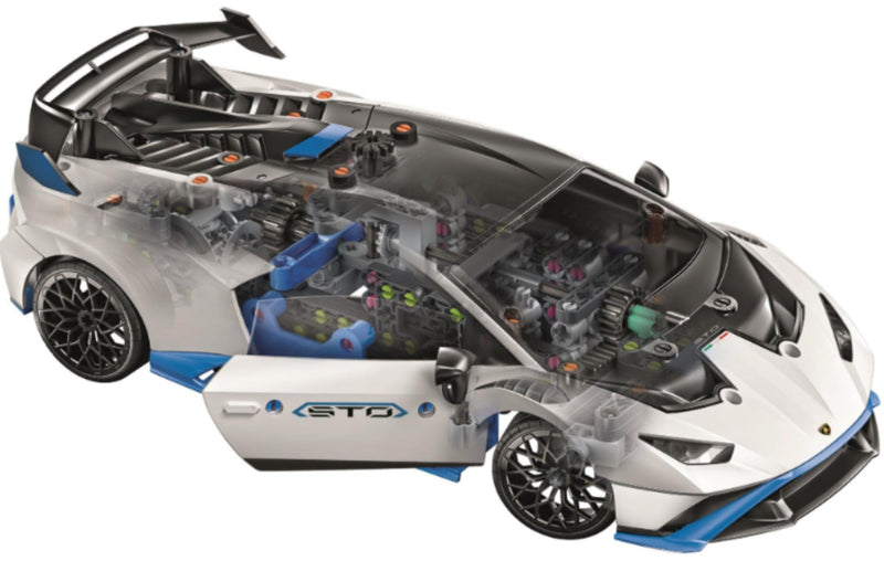 A white, black, and blue toy sports car model shown from a high angle, with its doors open to reveal a detailed internal mechanical structure and driver's seat. The side door features the text 'STM'.