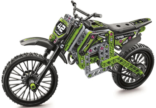 A toy construction-brick motorcycle modeled after a dirt bike, featuring a black frame with bright lime green and gray mechanical details, on a white background.