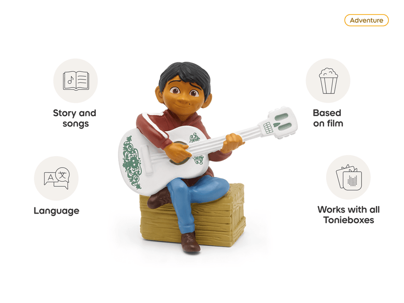 Tonie Disney Coco figurine of Miguel with guitar sitting on hay bale with feature icons