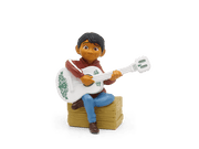 Tonie figurine of Miguel from Disney Coco with white guitar on wooden crate