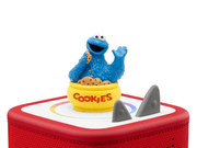 Cookie Monster Tonie figure on red Toniebox audio player with white background