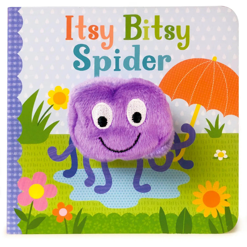 A children's finger puppet board book titled "Itsy Bitsy Spider" showing a plush purple spider character popping up from a blue puddle on a colorful illustrated cover with flowers, grass, and an orange umbrella.