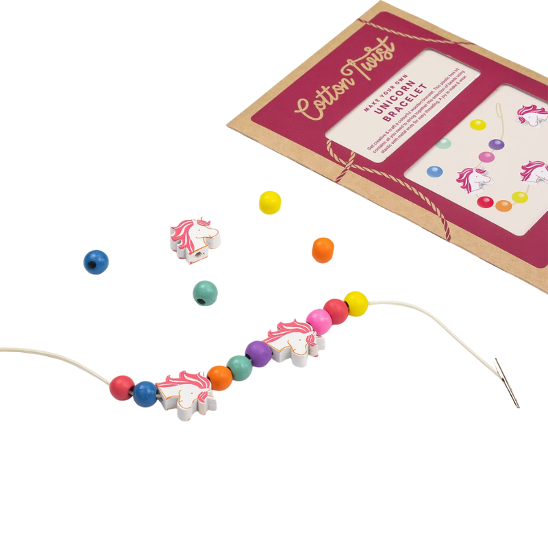 Cotton Twist unicorn bracelet kit with colorful beads and packaging on a white background.