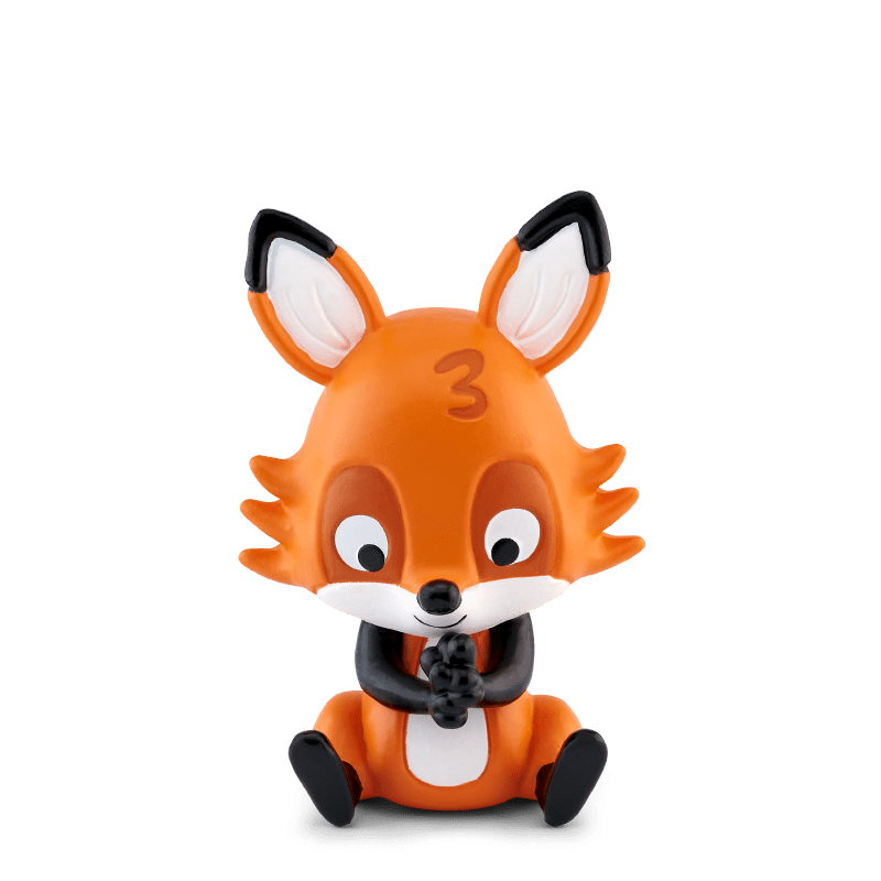 Orange fox Tonie character with black ears and white chest sitting upright