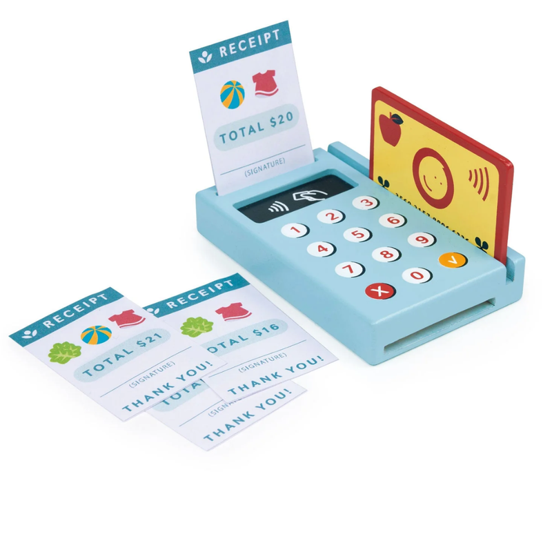 Toy credit card scanner with receipts on a white background.