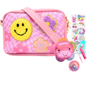 Pink crossbody bag from Hot Focus with smiley face patch and decorative accessories on white background.