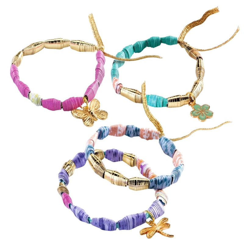 Set of colorful beaded bracelets with floral charms on a white background